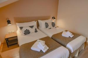 Postel nebo postele na pokoji v ubytování Savaneti Eco Hotel