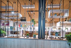 Reštaurácia alebo iné gastronomické zariadenie v ubytovaní JUFA Hotel Wipptal