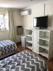 Cama ou camas em um quarto em Chenin Lodge