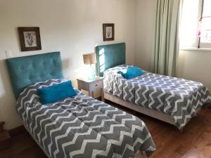 Ліжко або ліжка в номері Chenin Lodge