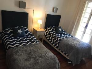 Cama ou camas em um quarto em Chenin Lodge