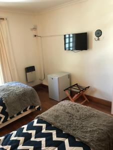 Cama ou camas em um quarto em Chenin Lodge