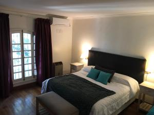 Cama ou camas em um quarto em Chenin Lodge