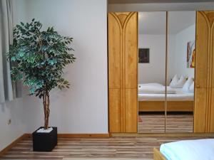 Voodi või voodid majutusasutuse Appartements am Kirchplatz toas