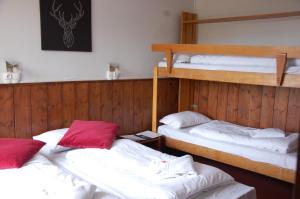 Postel nebo postele na pokoji v ubytování Hotel Le Refuge