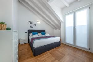 Casa da Suite Futura tesisinde bir odada yatak veya yataklar