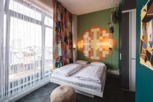 Postel nebo postele na pokoji v ubytování Superbude Hamburg Altona