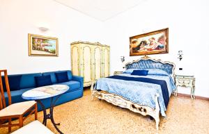 Postel nebo postele na pokoji v ubytování Residenza Sole Amalfi