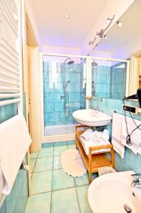 Koupelna v ubytování Residenza Sole Amalfi + 30 fotografií