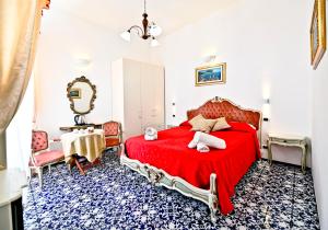 Postel nebo postele na pokoji v ubytování Residenza Sole Amalfi