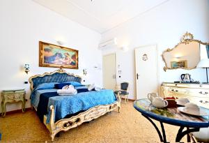 Postel nebo postele na pokoji v ubytování Residenza Sole Amalfi