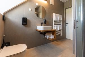 Koupelna v ubytování Guesthouse & Camping Danica Bohinj + 37 fotografií