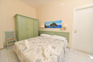 Postel nebo postele na pokoji v ubytování Albergo Atlantic