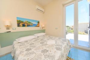 Postel nebo postele na pokoji v ubytování Albergo Atlantic