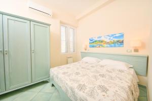 Postel nebo postele na pokoji v ubytování Albergo Atlantic