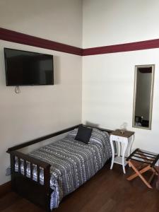 Cama ou camas em um quarto em Chenin Lodge