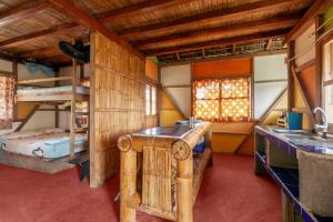 Postel nebo postele na pokoji v ubytování La Casa Mompiche