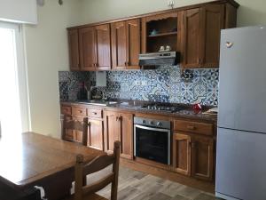 Kuchyň nebo kuchyňský kout v ubytování CAVALIERE suite & rooms