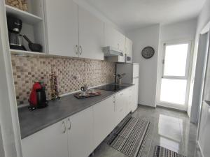 Kuchnia lub aneks kuchenny w obiekcie ApartaSol
