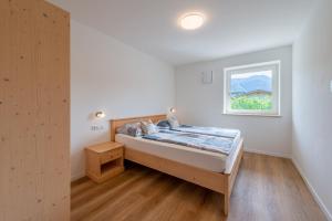 Postel nebo postele na pokoji v ubytování Haus Stolz