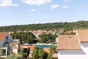 a view of a city with houses and a lake at Luxury Apartment Flora, Stari Grad, Hvar Island in Stari Grad +66 photos