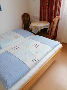Hotel Weidnerhof客房内的一张或多张床位