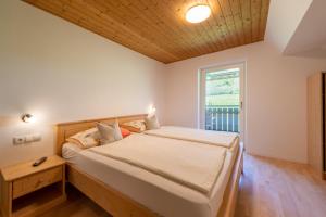 Postel nebo postele na pokoji v ubytování Haus Stolz