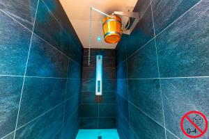 Ванная комната в Hôtel L'Escale - Piscine & SPA
