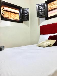 Ένα ή περισσότερα κρεβάτια σε δωμάτιο στο Apart- Groupe Marhaba
