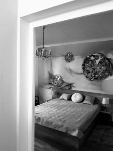 Postel nebo postele na pokoji v ubytování Gila Mari Gold Apartman