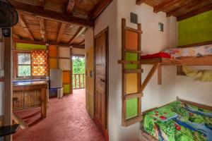 Postel nebo postele na pokoji v ubytování La Casa Mompiche