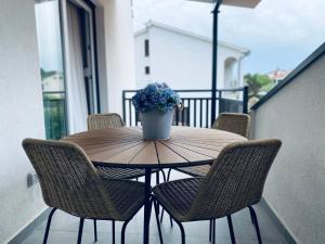Ein Balkon oder eine Terrasse in der Unterkunft Apartment Mouette