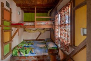 Postel nebo postele na pokoji v ubytování La Casa Mompiche