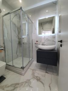 Koupelna v ubytování Apartmani Lavin + 37 fotografií