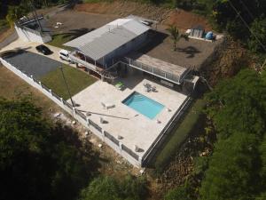 La alberca dentro o cerca de Palm's Bohemian House with Private Pool
