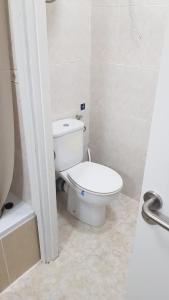 Ванная комната в Vivienda vacacional Arisa +10 фотографий