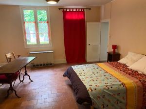 Postel nebo postele na pokoji v ubytování Maison 2 chambres proche Zoo Beauval 41
