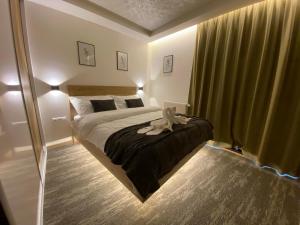 A bed or beds in a room at Matrix