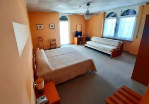 Ένα ή περισσότερα κρεβάτια σε δωμάτιο στο Hotel Terminus