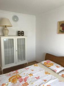 Postel nebo postele na pokoji v ubytování Apartment Marie