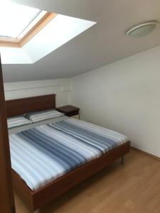 Postel nebo postele na pokoji v ubytování Apartment Marie