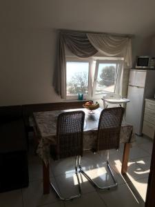 Kuchyň nebo kuchyňský kout v ubytování Apartment Marie