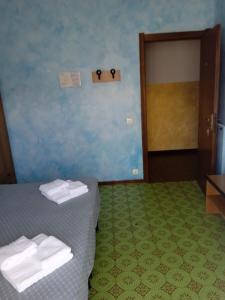 Voodi või voodid majutusasutuse Albergo Stella Di Mare toas
