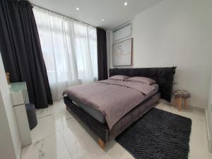 Postel nebo postele na pokoji v ubytování Apartmani Lavin