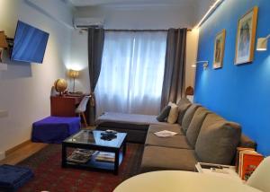 A seating area at Royal Blue Grand Suite No 3
