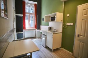 Kuchyňa alebo kuchynka v ubytovaní Z40 Apartments - hostAID + 3 fotografie