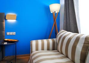 A seating area at Royal Blue Grand Suite No 3