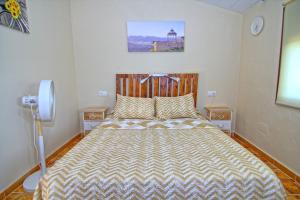 Posteľ alebo postele v izbe v ubytovaní Apartamento Rural Vainilla