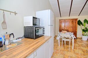 Kuchyňa alebo kuchynka v ubytovaní Apartamento Rural Vainilla + 19 fotografií