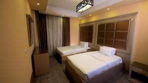 Кровать или кровати в номере Villa 14 Suites